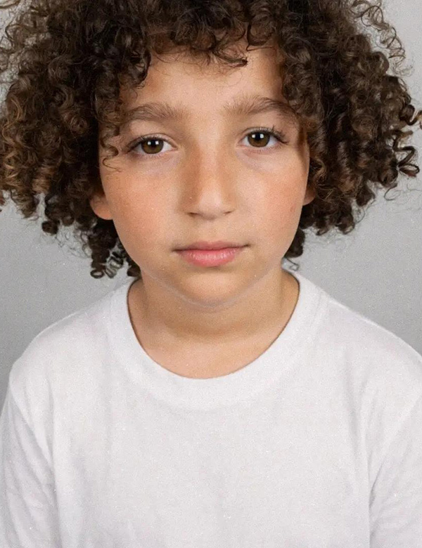 Kindermodel bruin krullend haar Adam k.