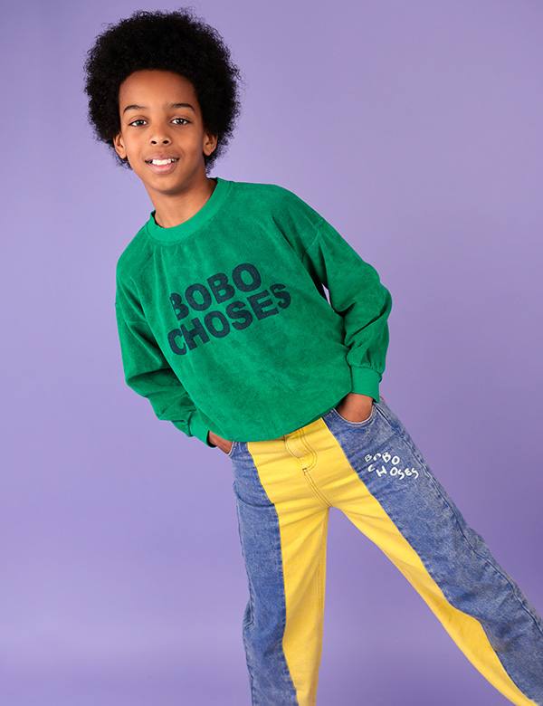 Kinderlijk model met bruin krullend haar en bruine ogen Gabriel A.