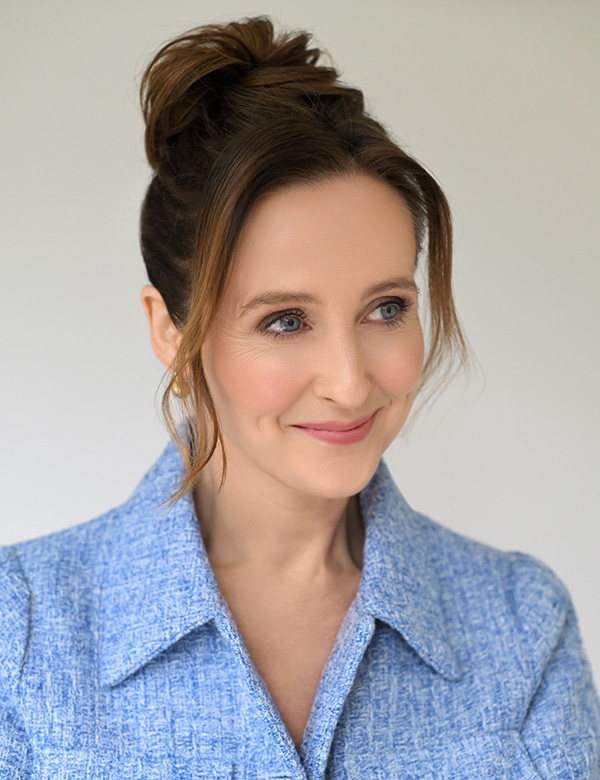 Vrouwelijk model met bruin haar en blauwe ogen Inge V.