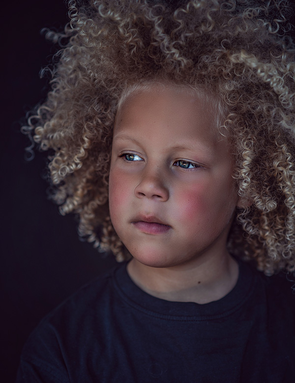 Kindermodel krullend haar Jaxx