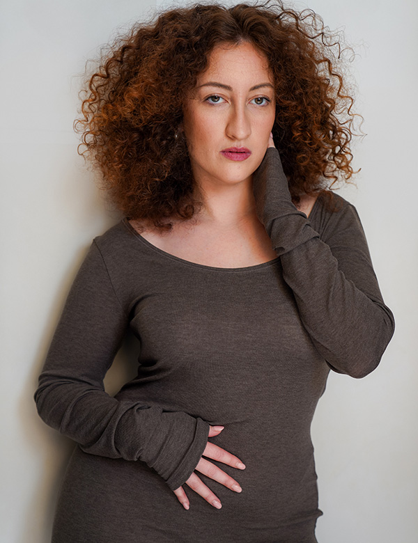 vrouwelijk model met rossige krullen Judith K.