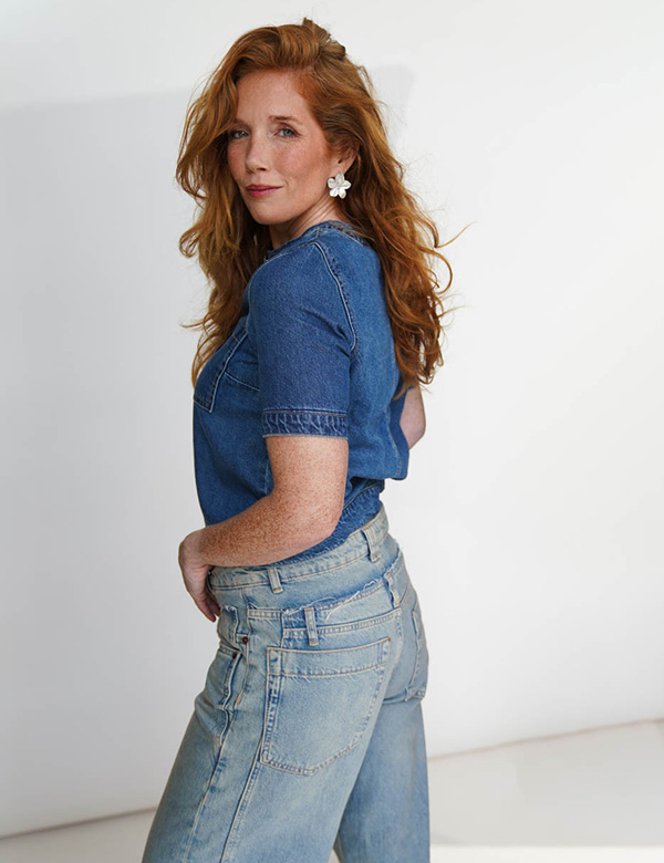 Vrouwelijk model met lang rossig haar Leandra B.