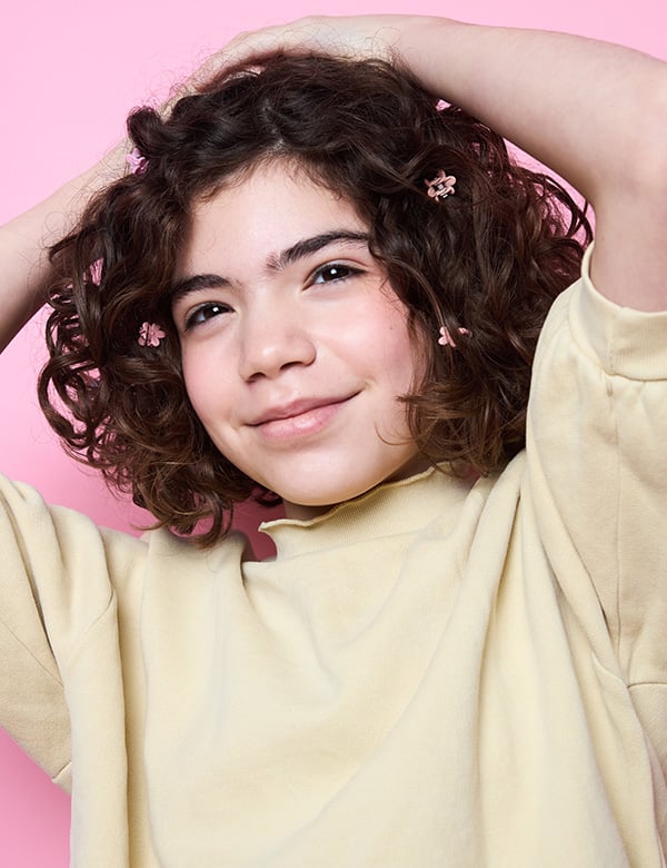 Kindermodel met bruin krullend haar Lianne G.