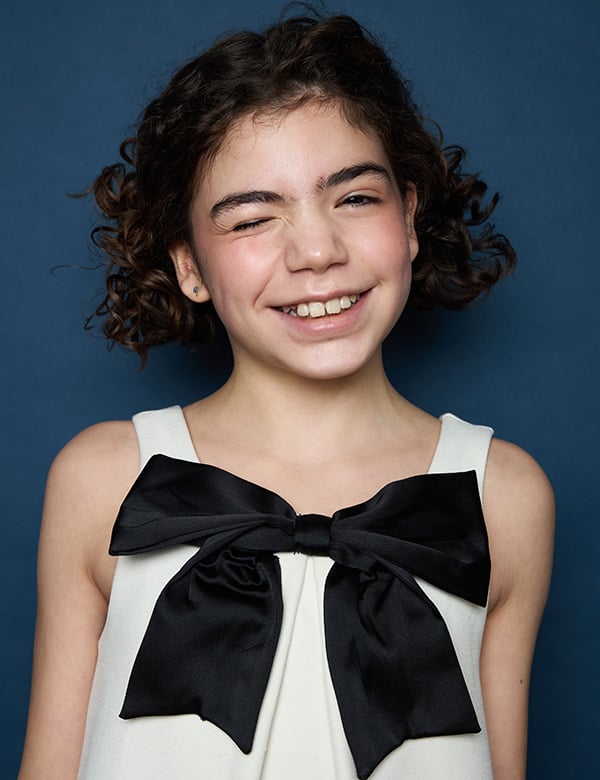 Kindermodel met bruin krullend haar Lianne G.