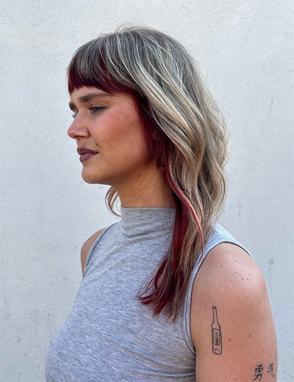 Vrouwelijk model met blond/rood haar Lindsay W.