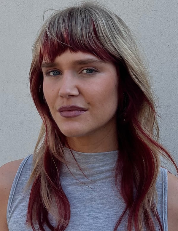 Vrouwelijk model met blond/rood haar lindsay w.