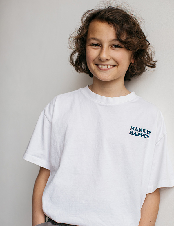Kinderlijk model met bruin krullend haar Raff Sl.
