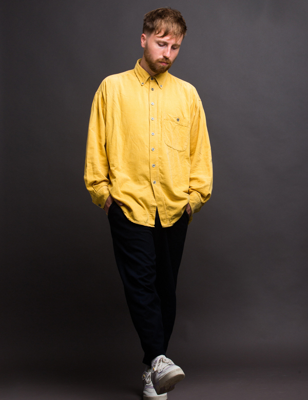 Mannelijk model met donkerblond haar Rick