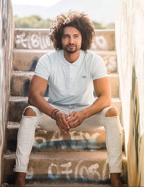 Mannelijk model zwart haar Robin B.