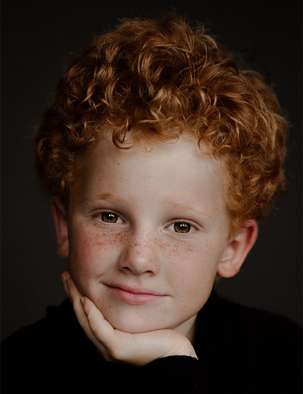 Kindermodel met rood haar Tim