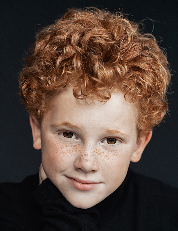 Model Kindermodel met rood haar tim