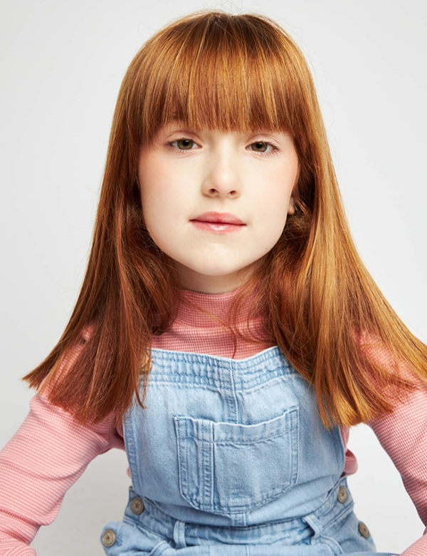 Kindermodel met rood bruin haar Elise Ba.