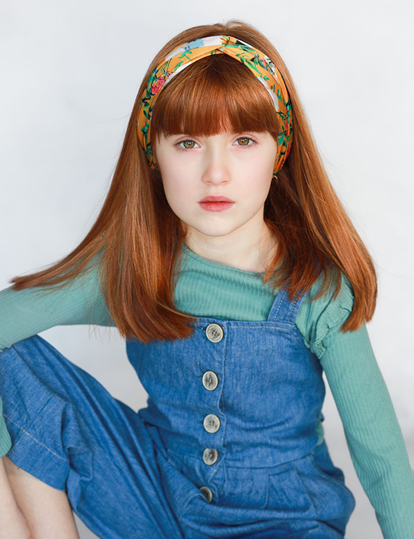 Kindermodel met rood bruin haar Elise Ba.