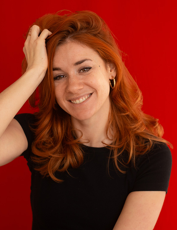 Vrouwelijk model met rood haar Gina