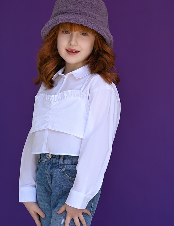 Kindermodel met rood bruin haar Elise Ba.
