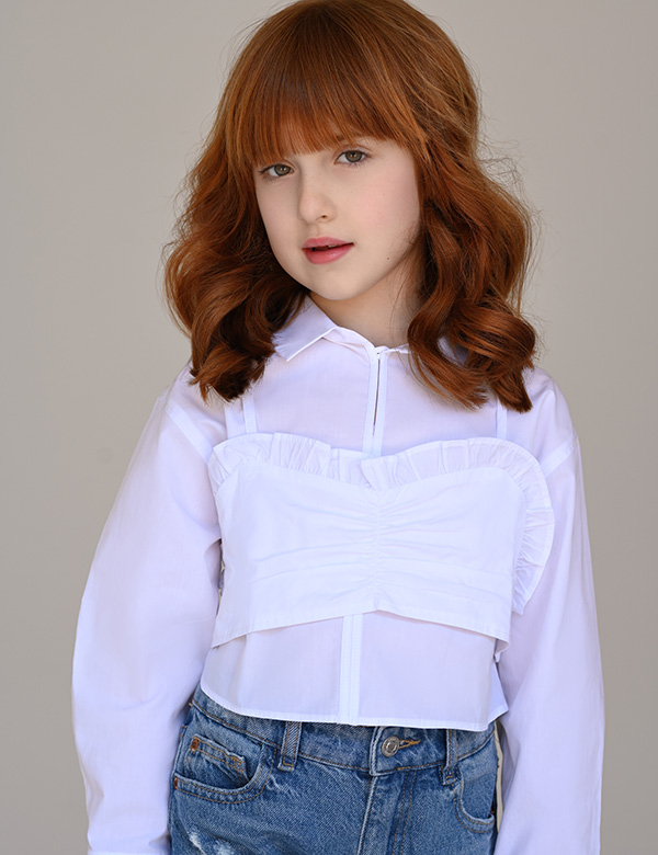 Kindermodel met rood bruin haar Elise Ba.