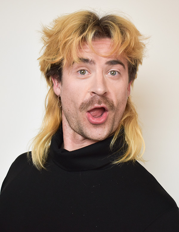 Mannelijk model met blond haar en blauw-groene ogen Floris W.