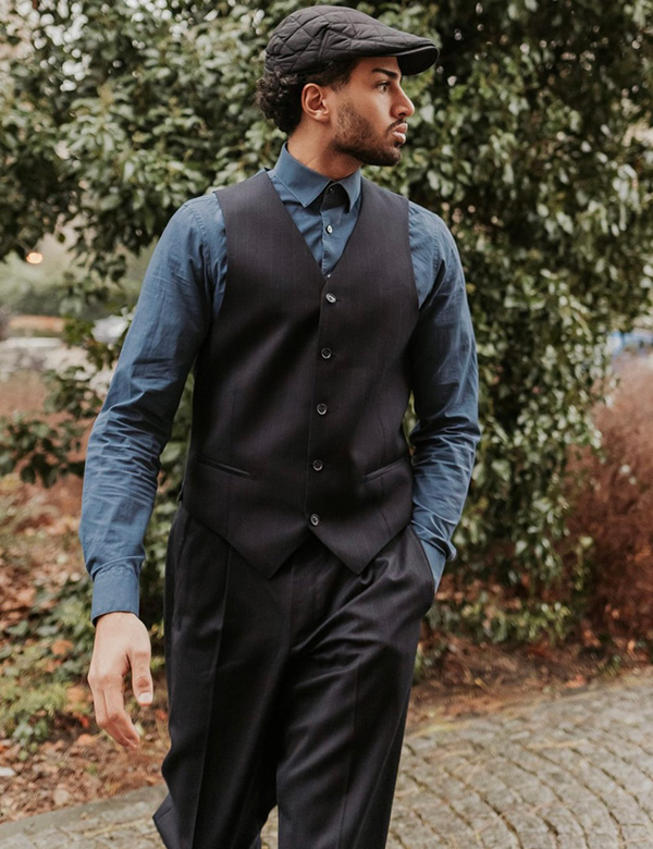 Mannelijk model krullend haar Ahmed