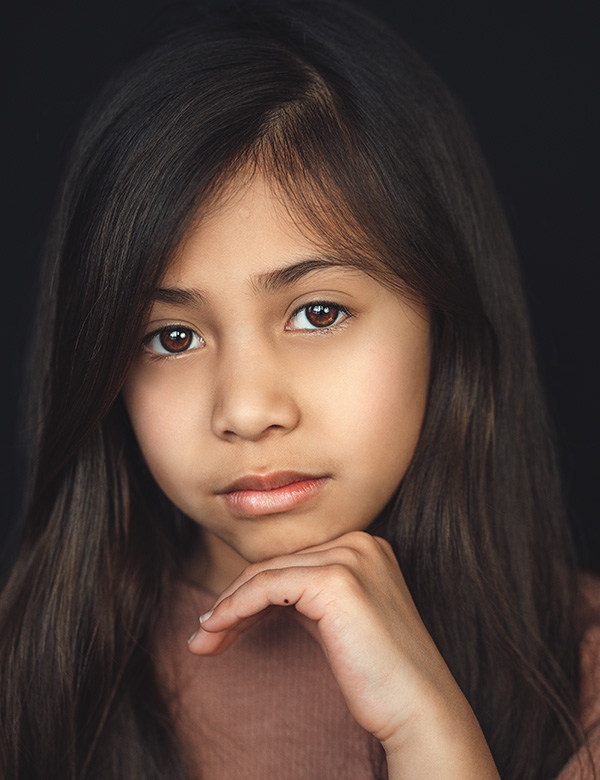 Kindermodel met bruin haar Caithlyn J.