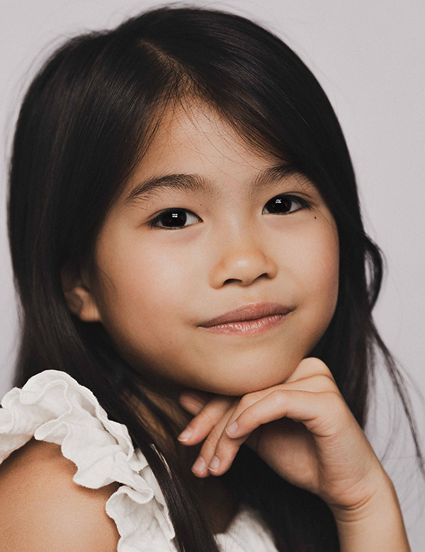 Kindermodel met zwart haar Charlene