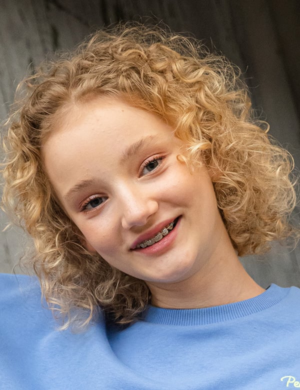 Kindermodel met krullend haar eloïse