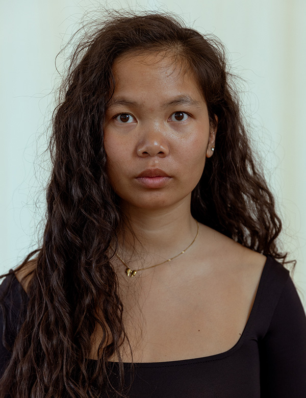Vrouwelijk model donker haar Zhu Fei