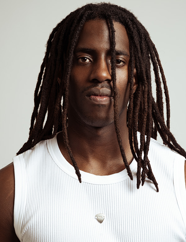 Mannelijk model met donkere huid Denzel