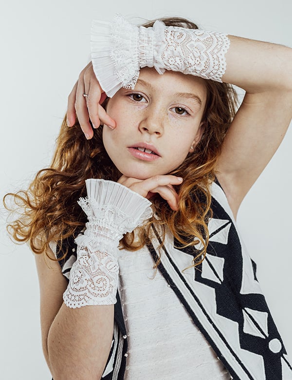 Kinderlijk model met roodbruin haar Quinthe.