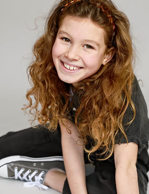 Kinderlijk model met roodbruin haar Quinthe.