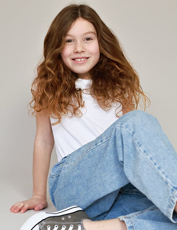Kinderlijk model met roodbruin haar Quinthe.
