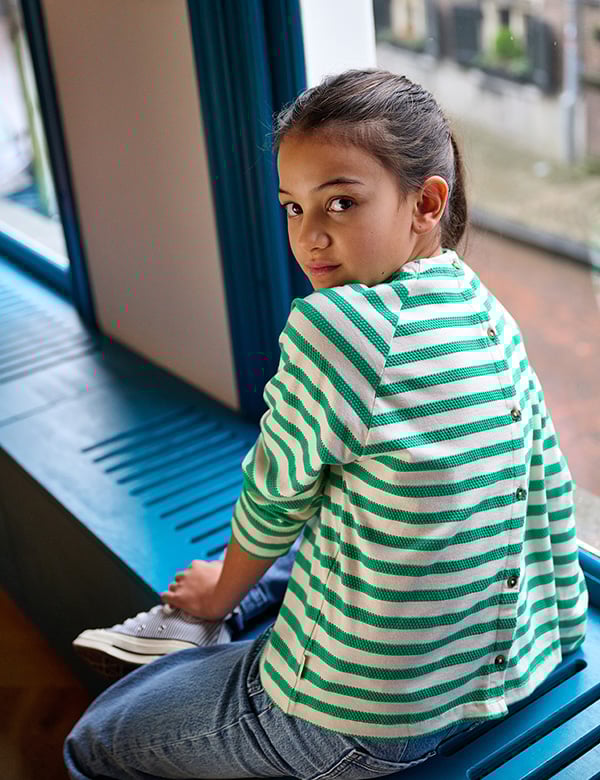 Kinderlijk model met bruin haar Sophie Sc.