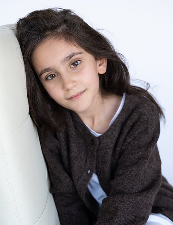 Kindermodel met bruin haar Adelina