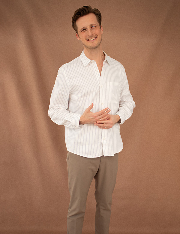 Mannelijk model met blond haar en groen-grijze ogen Dirk B.