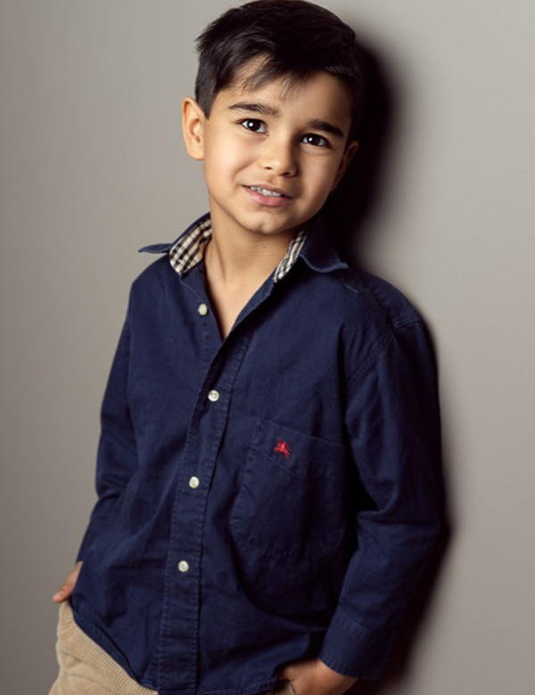 Kinderlijk model met bruin haar en bruine ogen Stan T.
