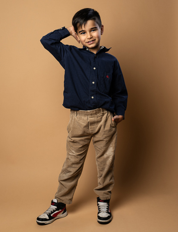 Kinderlijk model met bruin haar en bruine ogen Stan T.