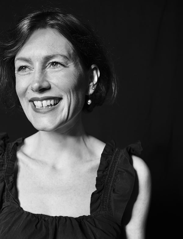 Vrouwelijk model met roodbruin haar en blauw-groene ogen Lin H.