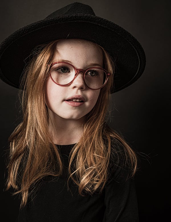 Kinderlijk model met rossig haar en blauw-groene ogen Mirthe S.
