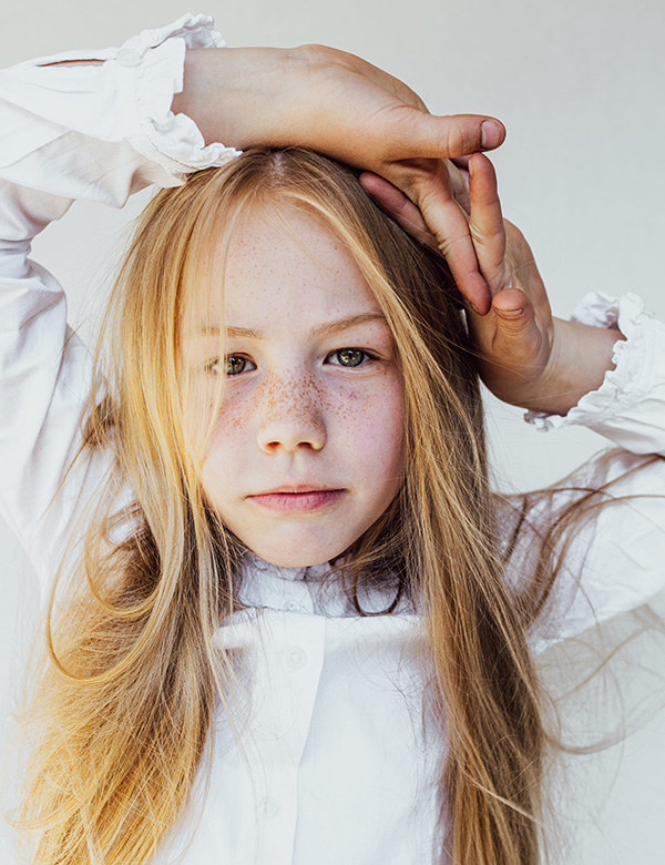Kinderlijk model met blond/rossig haar en blauw-groene ogen Lise S.