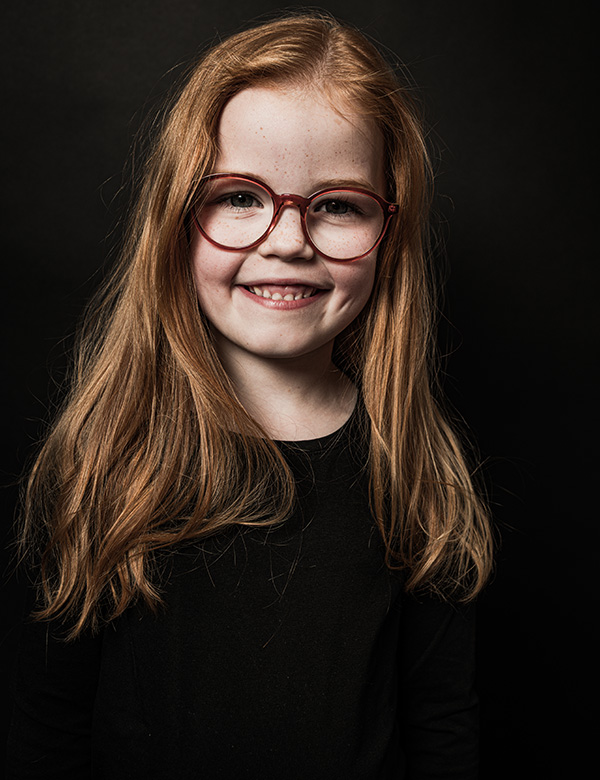 Kinderlijk model met rood haar en blauw-groene ogen Mirthe S.