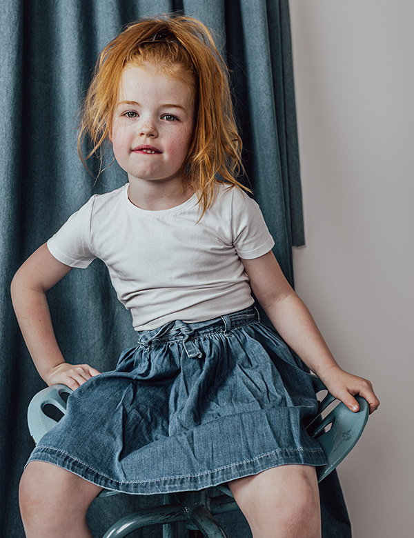 Kinderlijk model met rood haar en blauw-groene ogen Mirthe S.