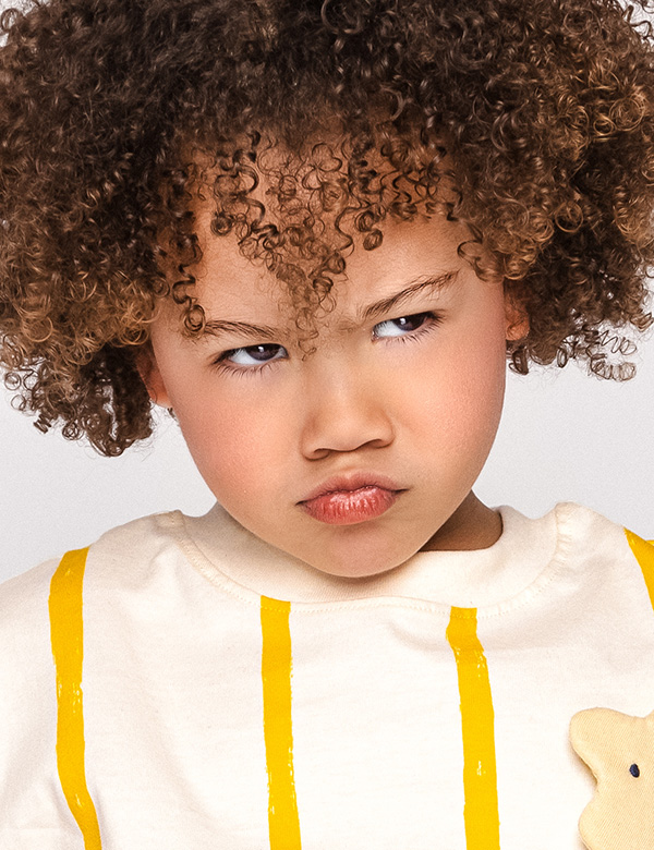 Kindermodel met bruin krullend haar Lulu W.