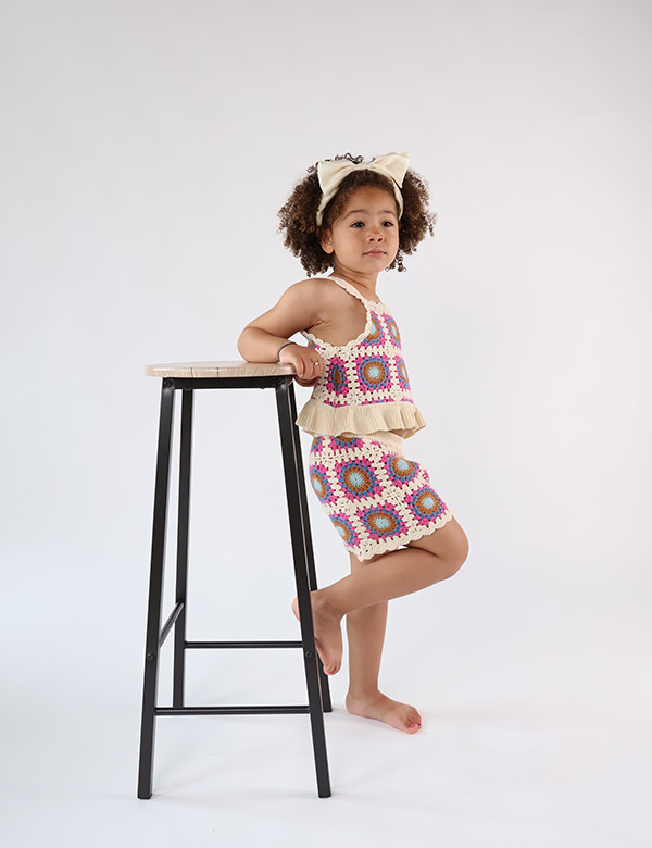 Kindermodel met bruin krullend haar Lulu W.