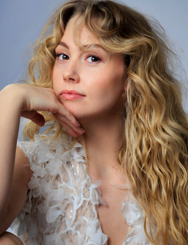 vrouwelijk model met blond haar Soraya G.