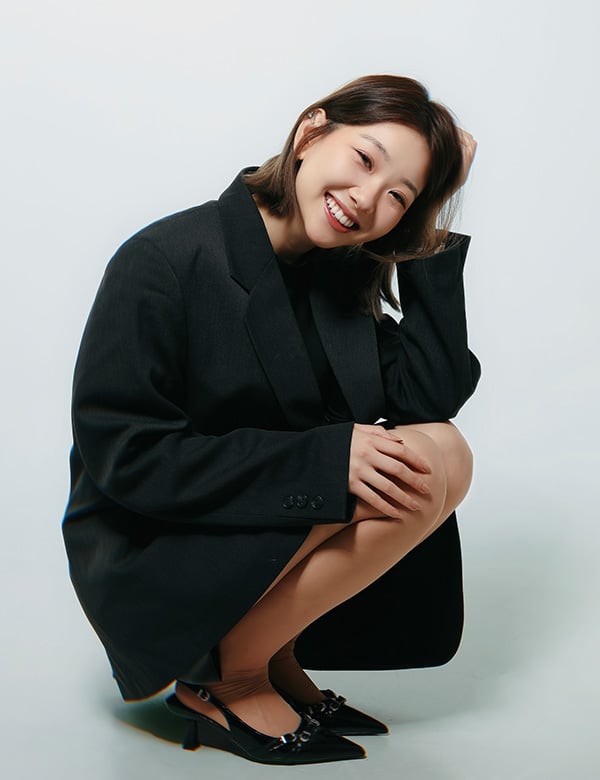 vrouwelijk model met donker haar Eileen