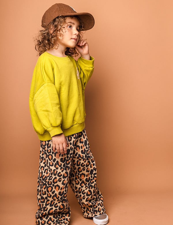 Kinder model met bruin krullend haar Joy T.