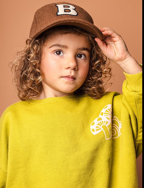 Kinder model met bruin krullend haar Joy T.