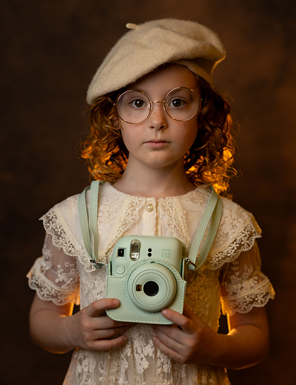 Kinderlijk model met rood haar Zoey Ko.