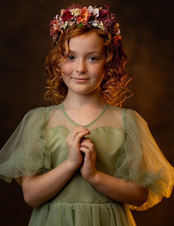 Kinderlijk model met rood haar Zoey Ko.