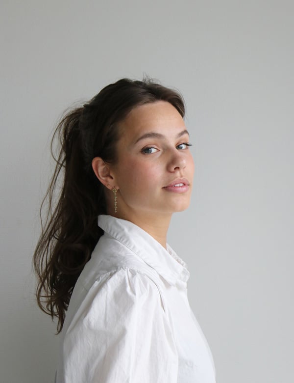 vrouwelijk model met bruin haar Zawani.