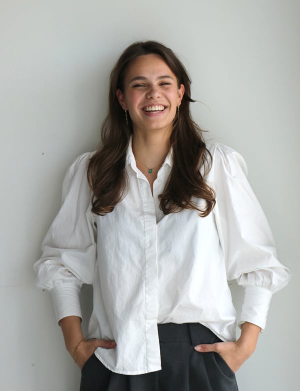 vrouwelijk model met bruin haar Zawani.